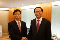 Bộ trưởng Trần Đại Quang hội kiến Ủy viên Bộ Chính trị, Bí thư Ủy ban Chính pháp Trung ương Đảng Cộng sản Trung Quốc Mạnh Kiến Trụ. (Ảnh: Trung Kiên/TTXVN)