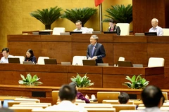 Chánh án Toà án Nhân dân Tối cao Nguyễn Hoà Bình phát biểu làm rõ một số vấn đề đại biểu Quốc hội nêu. (Ảnh: Dương Giang/TTXVN)