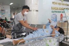 Một bệnh nhi bị tai nạn giao thông khám, điều trị tại Bệnh viện Nhi đồng 2 Thành phố Hồ Chí Minh. (Ảnh: Đinh Hằng/TTXVN)