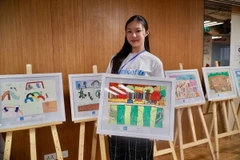 Bức tranh về chủ đề 'Sân chơi ước mơ' được trưng bày tại buổi lễ. (Ảnh: TTXVN phát)