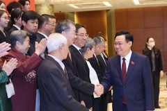 Chủ tịch Quốc hội Vương Đình Huệ với các đại biểu. (Ảnh: Nhan Sáng/TTXVN)