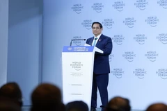 Thủ tướng Phạm Minh Chính phát biểu tại Phiên toàn thể Hội nghị thường niên các nhà tiên phong lần thứ 15 của WEF. (Ảnh: Dương Giang/TTXVN)