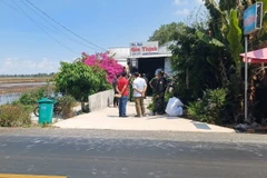 Hiện trường vụ việc tại nhà nghỉ ở phường 2, thị xã Ngã Năm, tỉnh Sóc Trăng. (Ảnh Tuấn Phi/TTXVN)