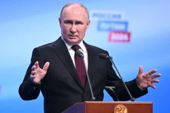 Tổng thống Nga Vladimir Putin trong cuộc họp báo tại Moskva sau khi kết quả bầu cử được công bố. (Ảnh: AFP/TTXVN)