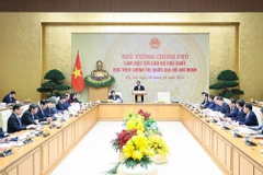 Thủ tướng Phạm Minh Chính làm việc với cán bộ chủ chốt Học viện Chính trị Quốc gia Hồ Chí Minh. (Ảnh: Dương Giang/TTXVN)