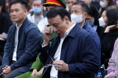 Bị cáo Đỗ Anh Dũng - Chủ tịch Hội đồng quản trị kiêm Tổng Giám đốc Công ty Tân Hoàng Minh tại phiên tòa. (Ảnh: Phạm Kiên/TTXVN)