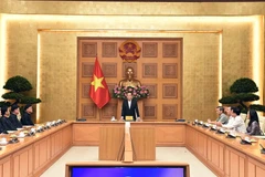 Trưởng Ban Kinh tế Trung ương, Phó Thủ tướng Chính phủ Trần Lưu Quang đã tiếp Đoàn chức sắc, chức việc Giáo hội Tịnh độ Cư sỹ Phật hội Việt Nam nhân dịp đoàn ra thăm thủ đô Hà Nội. (Nguồn: Báo Điện tử Chính phủ)