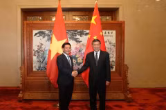 Bộ trưởng Bộ Công Thương Nguyễn Hồng Diên hội kiến Phó Thủ tướng Quốc vụ viện Trung Quốc Hà Lập Phong. (Nguồn: Báo Công Thương)