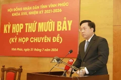 Chủ tịch Ủy ban Nhân dân tỉnh Vĩnh Phúc Trần Duy Đông phát biểu. (Ảnh: Hoàng Hùng/TTXVN)