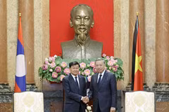 Chủ tịch nước Tô Lâm tiếp Tổng Bí thư, Chủ tịch nước Lào Thongloun Sisoulith. (Ảnh: Nhan Sáng/TTXVN)