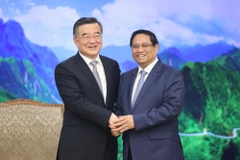 Thủ tướng Phạm Minh Chính tiếp Phó Ủy viên trưởng Ủy ban Thường vụ Đại hội Đại biểu Nhân dân Toàn quốc Trung Quốc Trương Khánh Vĩ. (Ảnh: Dương Giang/TTXVN)