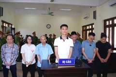 Các bị cáo tại phiên tòa. (Ảnh: Thanh Tuấn/TTXVN)
