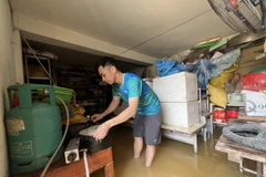 Nước tràn vào nhà anh Bế Minh Hoàng, tổ 41, phường Hợp Giang, thành phố Cao Bằng, tỉnh Cao Bằng. (Ảnh: Chu Hiệu/TTXVN)