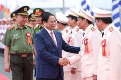 Thủ tướng Phạm Minh Chính với lãnh đạo Bộ Công an tham dự Lễ kỷ niệm. (Ảnh: Dương Giang/TTXVN)
