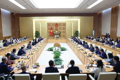 Thủ tướng Phạm Minh Chính tiếp Đoàn doanh nghiệp của Hội đồng Kinh doanh Hoa Kỳ-ASEAN. (Ảnh: Dương Giang/TTXVN)
