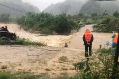 Khu vực cầu tràn qua suối Mon thuộc bản Áng, xã Đông Sang, huyện Mộc Châu, tỉnh Sơn La, nước lũ dâng lên cao khiến 2 người bị nước cuốn trôi. (Ảnh: TTXVN phát)