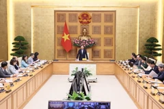 Phó Thủ tướng Trần Hồng Hà chủ trì cuộc họp. (Ảnh: Văn Điệp/TTXVN)