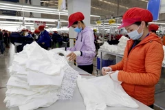 May hàng xuất khẩu. (Ảnh: Trần Việt/TTXVN)