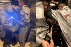 Lực lượng chức năng giải cứu người bị mắc kẹt. (Ảnh minh họa: TTXVN phát)