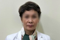 Đối tượng Bùi Thị Lượng tại cơ quan công an. (Ảnh: TTXVN phát)