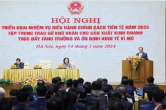 Thủ tướng Phạm Minh Chính phát biểu chỉ đạo Hội nghị triển khai nhiệm vụ điều hành chính sách tiền tệ năm 2024. (Ảnh: Dương Giang/TTXVN)