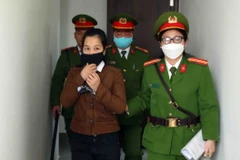 Bị cáo Nguyễn Thị Hà Thành đến phiên tòa xét xử sơ thẩm hồi năm 2022. (Ảnh: Phạm Kiên/TTXVN)