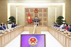 Thủ tướng Chính phủ Phạm Minh Chính giao nhiệm vụ cho các Phó Thủ tướng, Bộ trưởng vừa được Quốc hội phê chuẩn, bổ nhiệm. (Ảnh: Dương Giang/TTXVN)