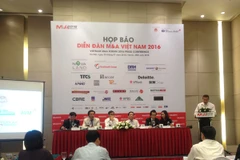 Họp báo Diễn đàn M&A Việt Nam 2016. (Ảnh: PV/Vietnam+)