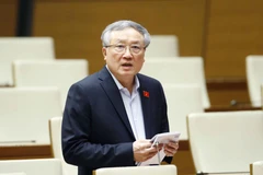 Chánh án Tòa án nhân dân tối cao Nguyễn Hòa Bình giải trình, làm rõ một số vấn đề đại biểu Quốc hội nêu. (Ảnh: Doãn Tấn/TTXVN)