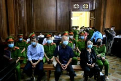 Bị cáo Nguyễn Thành Tài và Dương Thị Bạch Diệp tại phiên xét xử. (Ảnh: Thành Chung/TTXVN)