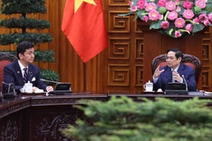 Thủ tướng Phạm Minh Chính tiếp Bộ trưởng Quốc phòng Nhật Bản Kishi Nobuo. (Ảnh: Dương Giang/TTXVN)