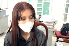 Đối tượng Phan Thị Kim Huệ (tự Nhi) tại cơ quan Công an. (Ảnh: TTXVN phát)