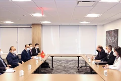 Chủ tịch nước Nguyễn Xuân Phúc tiếp lãnh đạo các tập đoàn. (Ảnh: Thống Nhất/TTXVN)