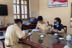Nữ tài xế Vũ T. T. làm việc tại cơ quan công an. (Nguồn: vietnamnet.vn)