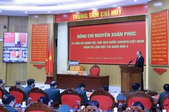 Chủ tịch nước Nguyễn Xuân Phúc phát biểu tại buổi làm việc. (Ảnh: Thống Nhất/TTXVN)