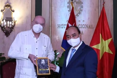 Chủ tịch nước Nguyễn Xuân Phúc tiếp Bộ trưởng Ngoại thương và Đầu tư nước ngoài Cuba Rodrigo Malmierca Díaz. (Ảnh: Thống Nhất/TTXVN)