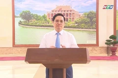 Thủ tướng Chính phủ Phạm Minh Chính phát biểu tại chương trình trực tuyến (ảnh chụp qua màn hình). (Ảnh: Thu Hương/TTXVN)