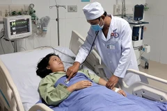Bệnh nhân H đã tỉnh táo, bình phục trở lại. (Ảnh: Trung Hiếu/TTXVN)