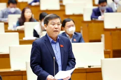 Viện trưởng Viện kiểm sát nhân dân tối cao Lê Minh Trí giải trình, làm rõ một số vấn đề đại biểu Quốc hội nêu. (Ảnh: Doãn Tấn/TTXVN)