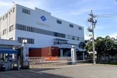 Các doanh nghiệp trong Khu chế xuất Tân Thuận có ca nhiễm COVID-19 tạm ngừng hoạt động để phòng dịch. (Ảnh: Thanh Vũ/TTXVN)