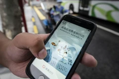 Ứng dụng đặt xe của Didi Global Inc trên điện thoại tại Trung Quốc. (Nguồn: Blooberg)