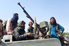 Lực lượng Taliban tại thủ phủ Mehtarlam, tỉnh Laghman, Afghanistan ngày 15/8/2021. (Ảnh: THX/TTXVN)