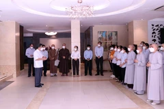 Lễ đón các tình nguyện viên tôn giáo hoàn thành nhiệm vụ hỗ trợ tuyến đầu tại bệnh viện Hồi sức chuyên sâu COVID-19 tại TP. Hồ Chí Minh. (Ảnh: Xuân Khu/TTXVN)