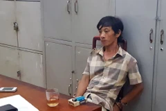 Đối tượng Hưng tại cơ quan công an. (Ảnh: Đậu Tất Thành/TTXVN)