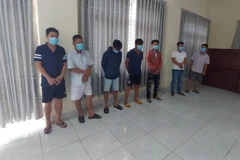 Các đối tượng bị công an bắt giữ. (Ảnh: Đậu Tất Thành/TTXVN)