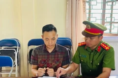 Bị can Đoàn Trọng Đạt tại Cơ quan Cảnh sát điều tra. (Ảnh: TTXVN phát)