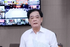 Tiến sỹ Nhị Lê, nguyên Phó Tổng Biên tập Tạp chí Cộng sản. (Ảnh: Phạm Kiên/TTXVN)