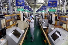 Công ty TNHH Nidec Tosok Việt Nam của nhà đầu tư Nhật Bản sản xuất các chi tiết cơ khí tại khu chế xuất Tân Thuận (Thành phố Hồ Chí Minh). (Ảnh: Danh Lam/TTXVN)