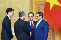 Thủ tướng Phạm Minh Chính tiếp Đại sứ Trung Quốc tại Việt Nam Hùng Ba đến chào từ biệt, kết thúc nhiệm kỳ công tác.(Ảnh: Dương Giang/TTXVN)