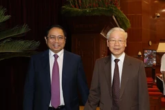 Tổng Bí thư Nguyễn Phú Trọng, Thủ tướng Chính phủ Phạm Minh Chính dự Hội nghị toàn quốc quán triệt và triển khai Nghị quyết 11-NQ/TW ngày 10/2/2022 của Bộ Chính trị. (Ảnh: Trí Dũng/TTXVN)